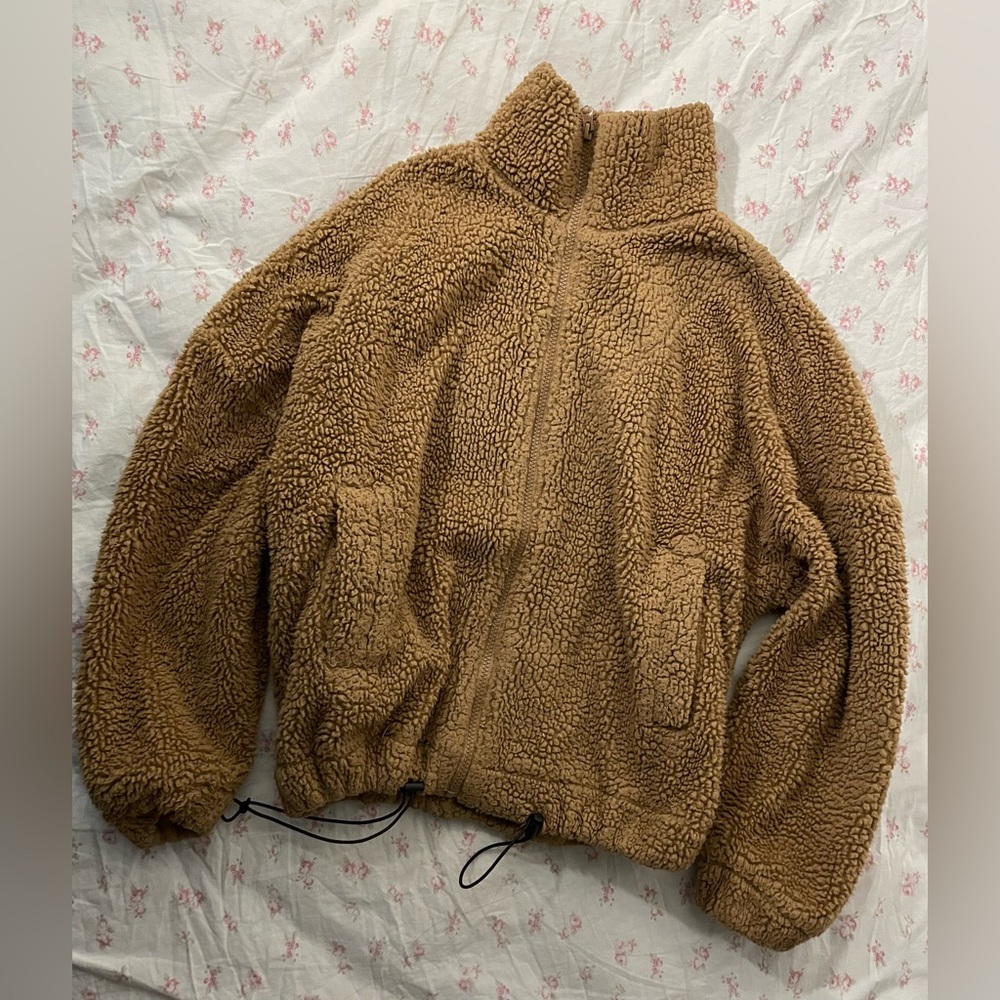 Soft brown teddy bear jacket.